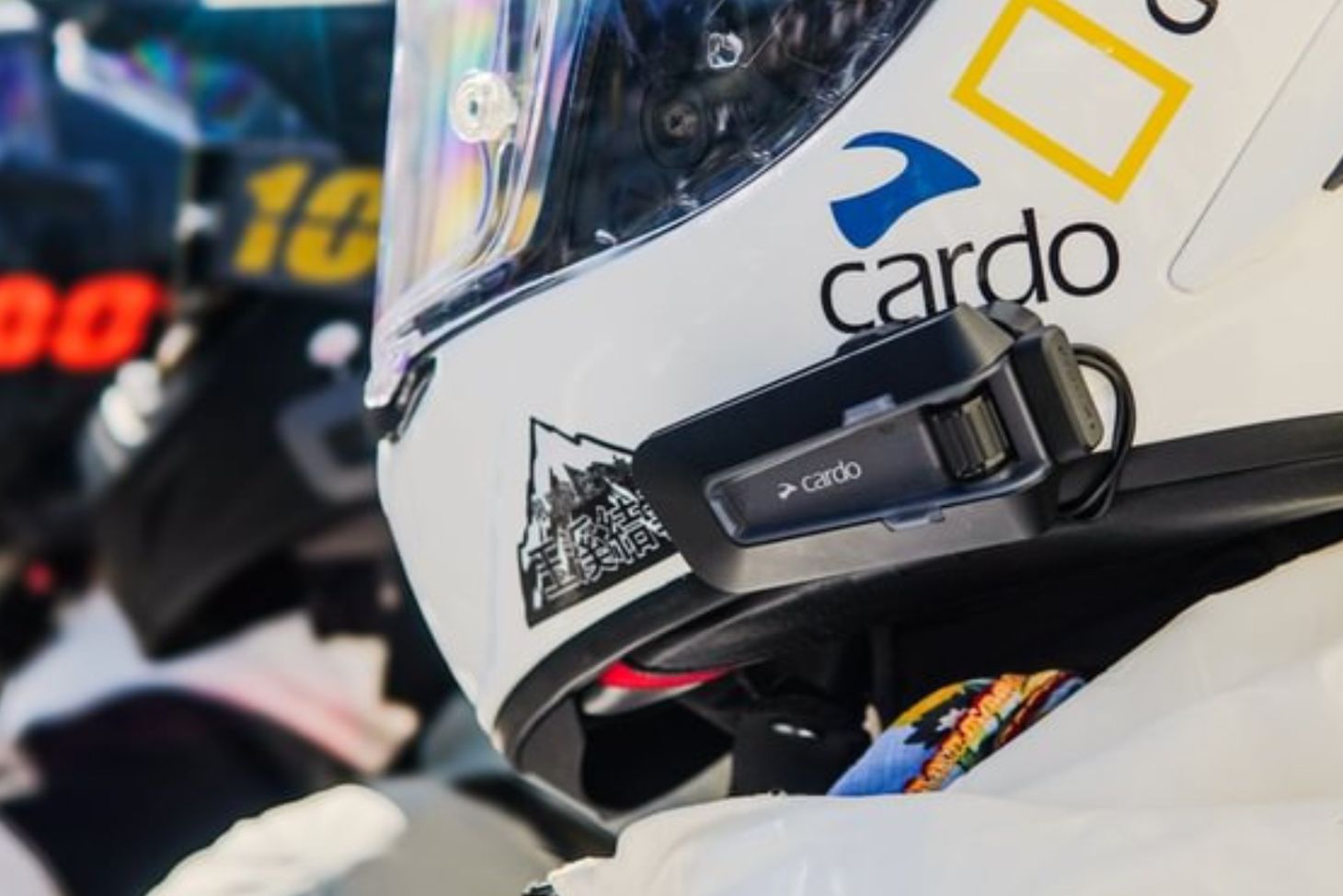 Cardo PACKTALK NEO installed on motorcycle helmet