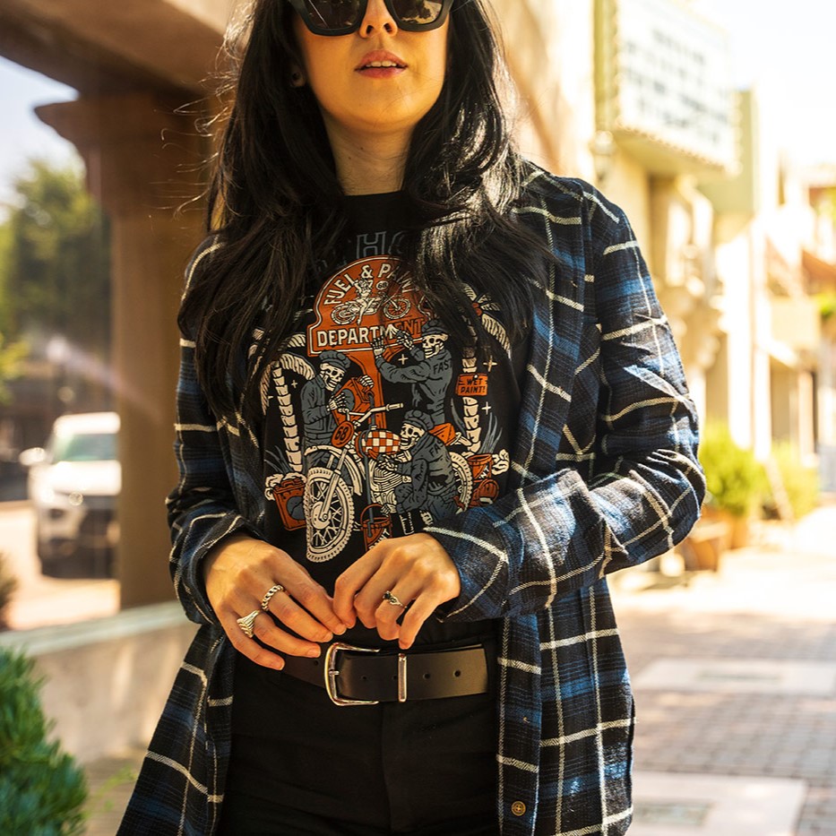 Blue-black plaid flannel over a faded graphic tee